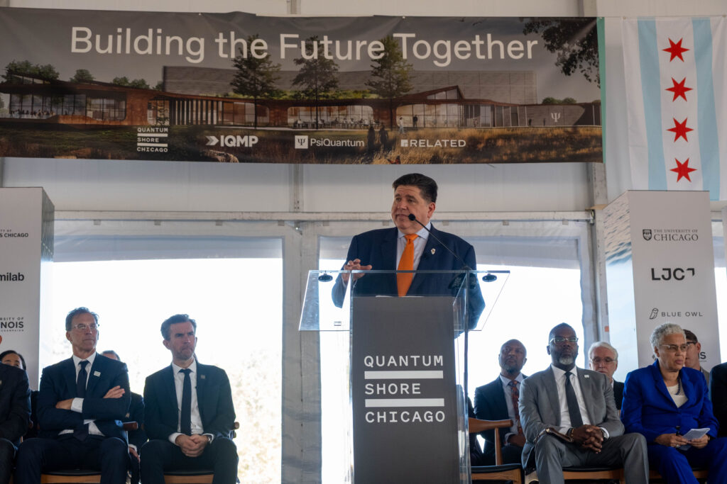 Gov. JB Pritzker speaks at the groundbreaking of the Illinois Quantum and Microelectronics Park on Tuesday in Chicago. Credit: Keerti Gopal/Inside Climate News