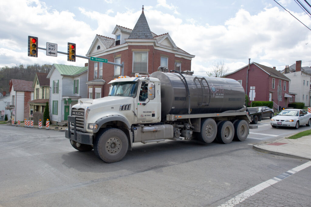 A waste water tank truck drives through Waynesburg, Pa. Credit: Mladen Antonov/AFP via Getty Images