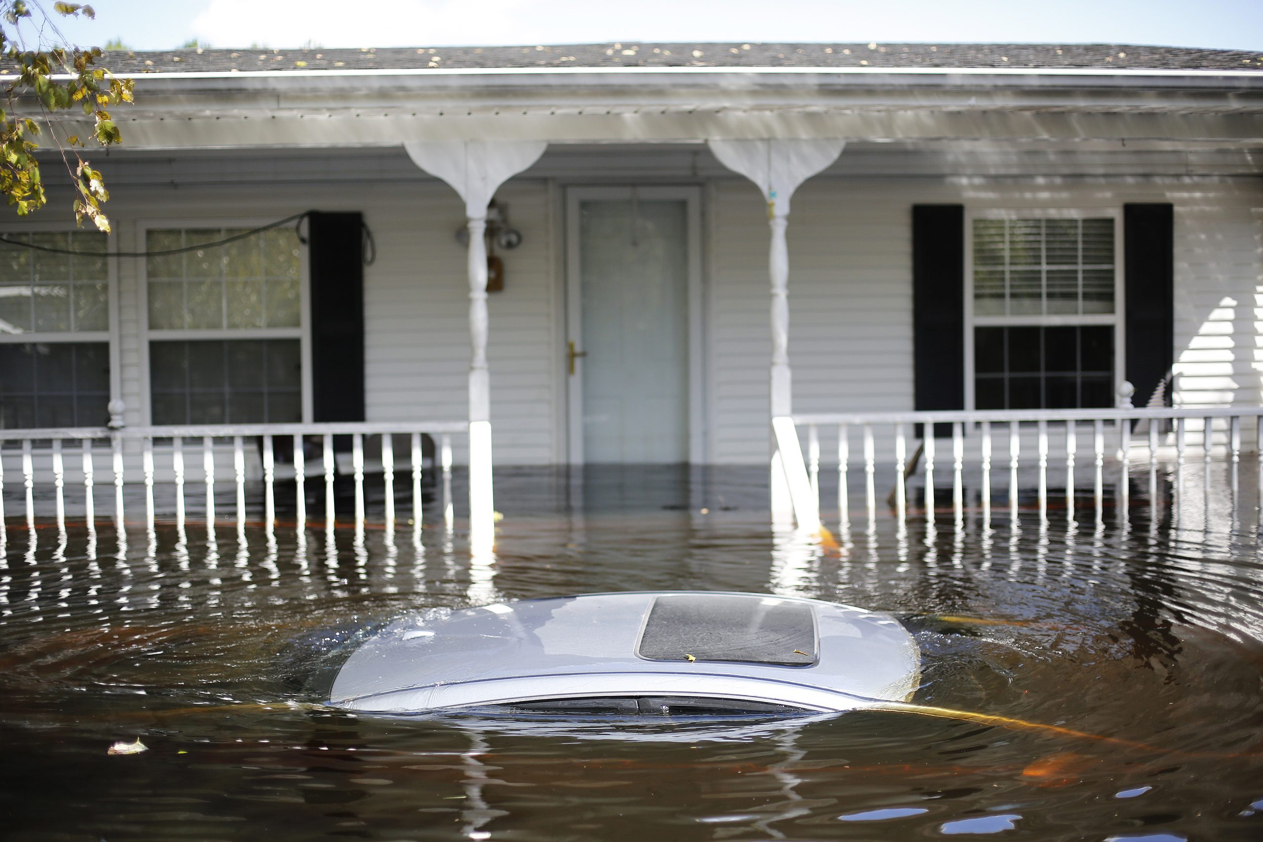 In Lumberton, North Carolina, a car floats in front of a flooded home in September 2018 in the aftermath of Hurricane Florence. Credit: Eamon Queeney/For The Washington Post via Getty Images
