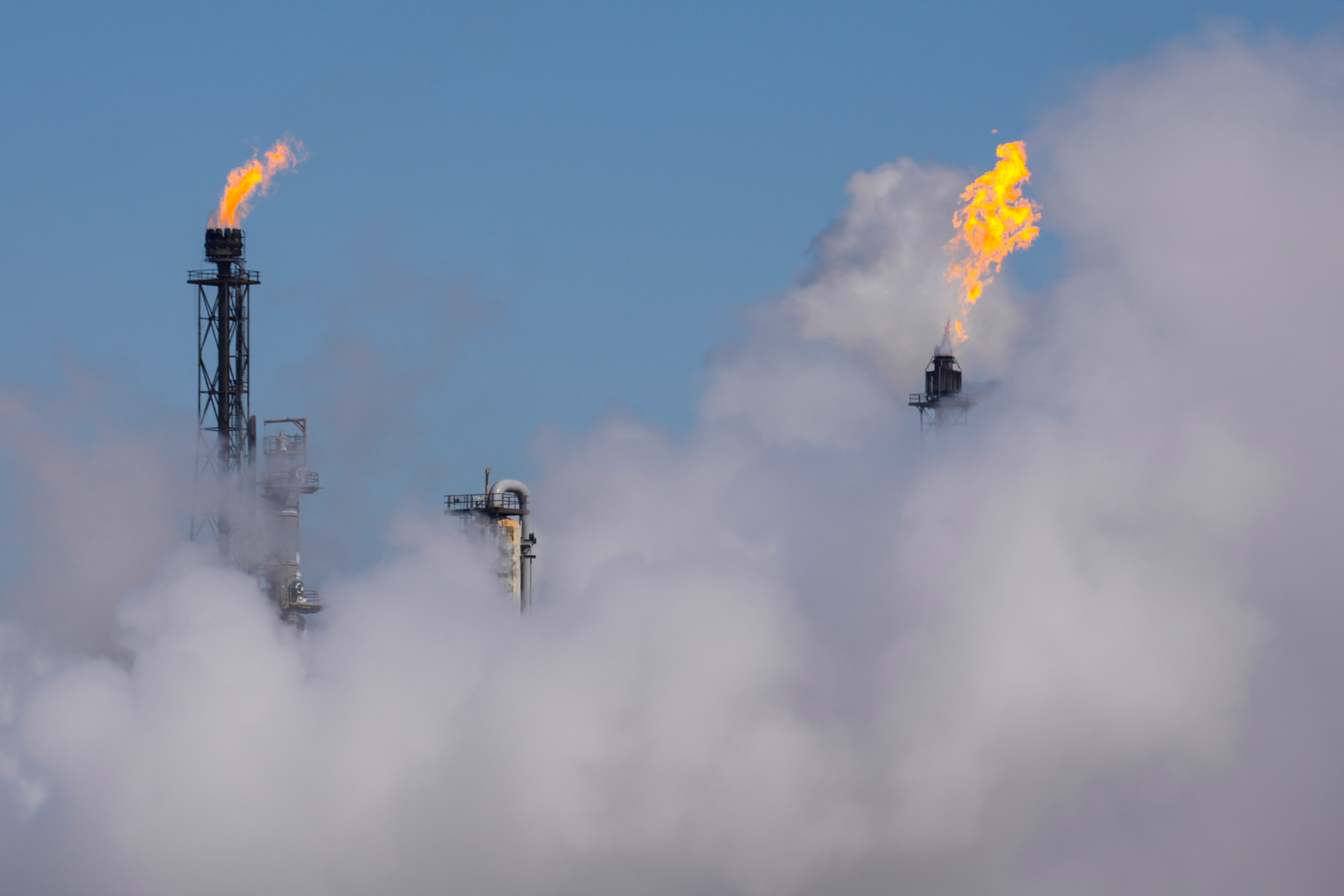 Steam rises from one of the plants near the Houston Ship Channel on Jan. 26 in Deer Park, Texas. Credit: Brett Coomer/Houston Chronicle via Getty Images