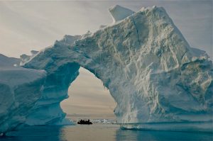 Researchers and tourists explore the edge of an ice shelf along the Antarctic Peninsula, which has warmed faster than nearly any other region in the past few decades. Credit Bob Berwyn/Inside Climate News