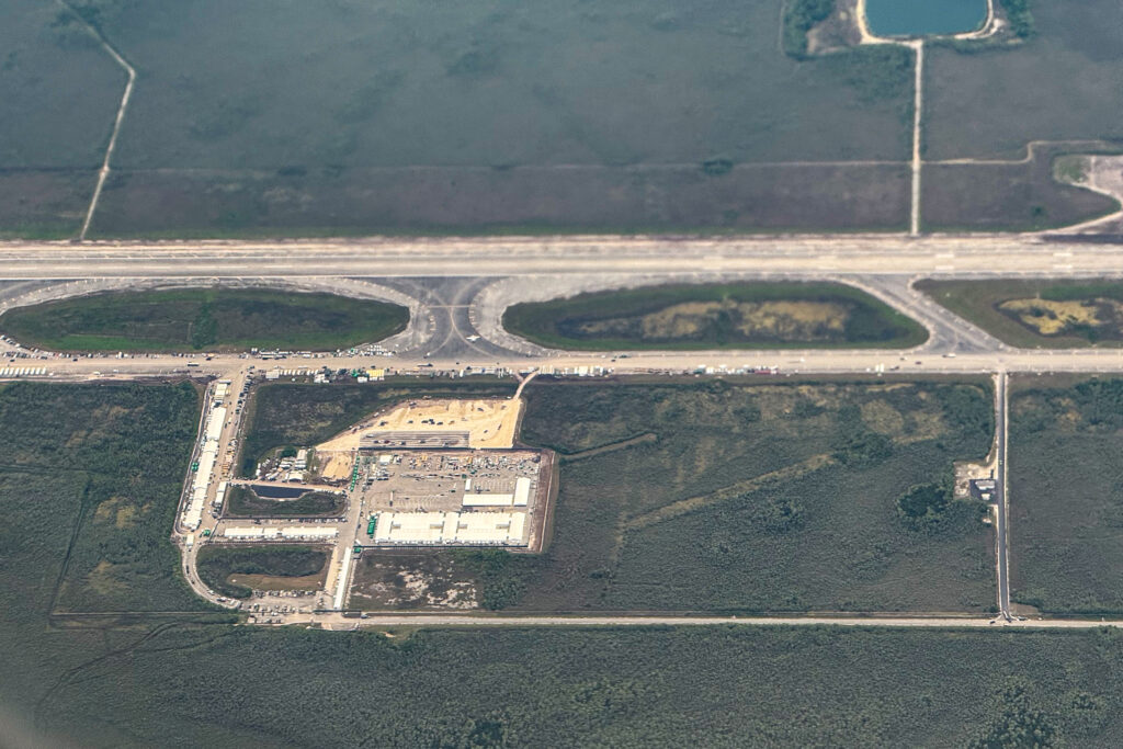 An aerial view of the migrant detention center known as Alligator Alcatraz in Ochopee, Fla. Credit: Chandan Khanna/AFP via Getty Images