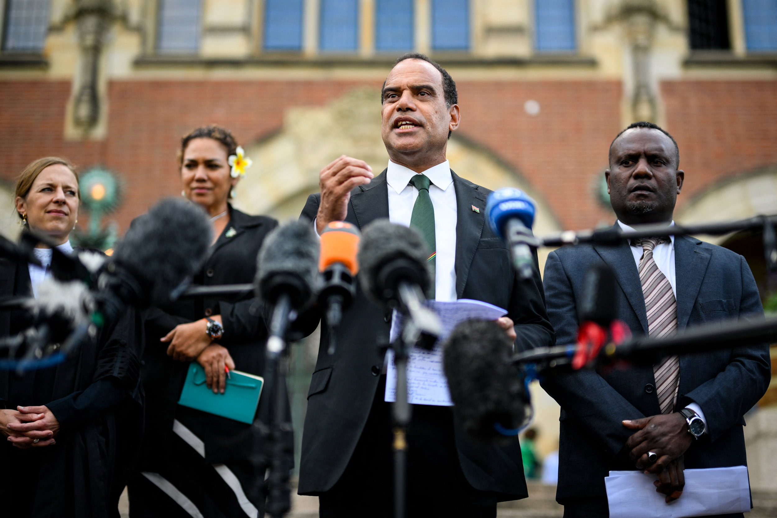 Vanuatu’s Climate Change Minister Ralph Regenvanu speaks to the media after an International Court of Justice session on states’ legal obligations to address climate change in The Hague, Netherlands, on July 23, 2025. Credit: John Thys/AFP via Getty Images