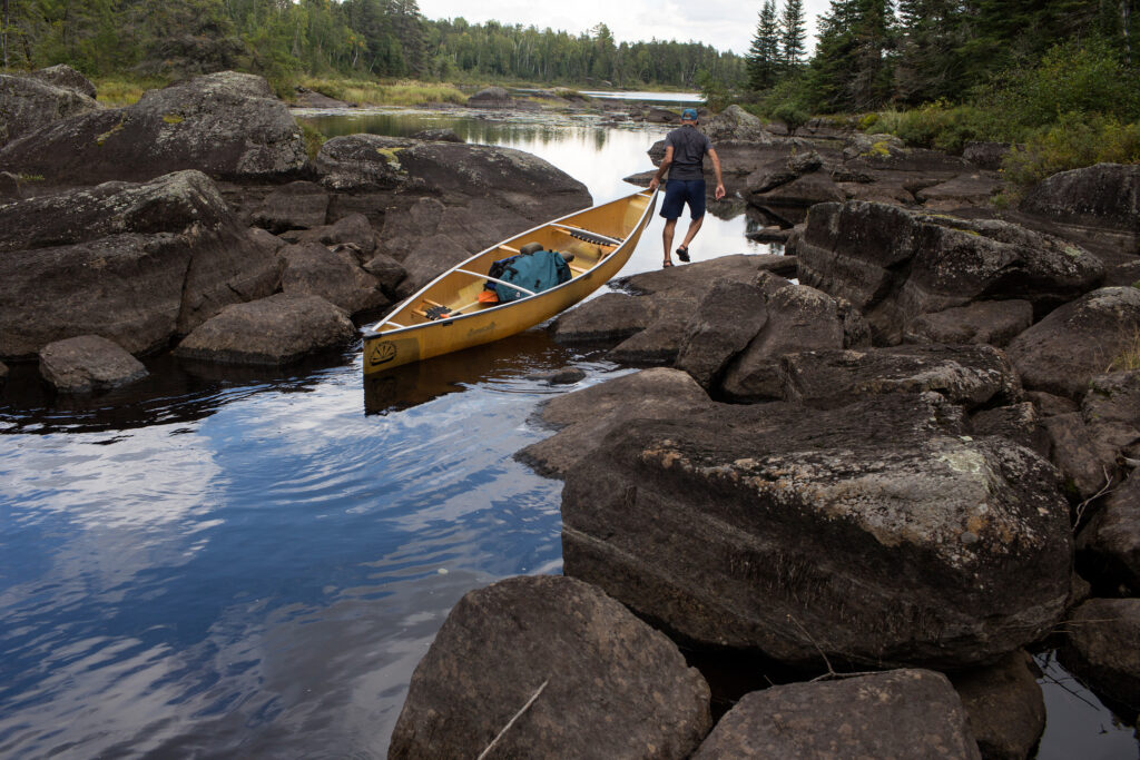 A person travels through the Boundary Waters Canoe Area Wilderness in September 2019 in northern Minnesota. Credit: Andrew Lichtenstein/Corbis via Getty Images