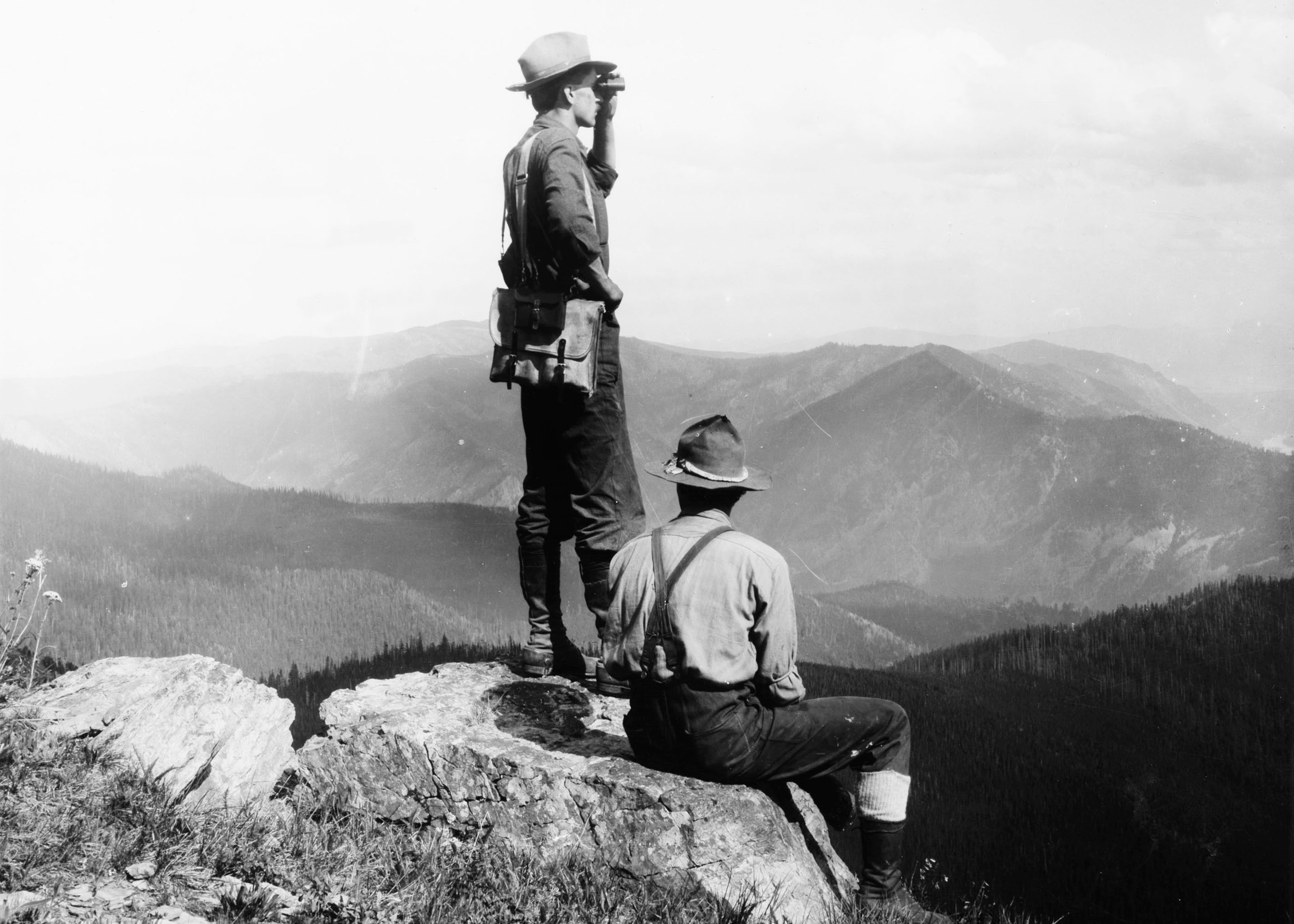 Ranger Griffin and Forest Guard Cameron on fire patrol duty in 1909 from the top of Mount Silcox near Thompson Falls, Mont. Credit: W. J. Lubken/Forest Service