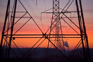 Transmission lines lead away from a coal-fired power plant in China Township, Mich. Credit: Jim West/UCG/Universal Images Group via Getty Images