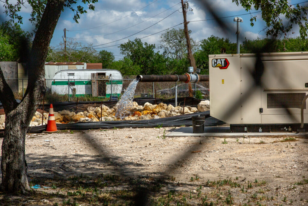 One of Corpus Christi’s emergency water wells discharges into the Nueces River on March 31. Credit: Dylan Baddour/Inside Climate News