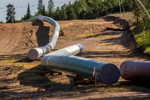 Sections of the Enbridge Line 3 oil pipeline are seen at the construction site near Wauburn, Minn., on June 5, 2021. Credit: Kerem Yucel/AFP via Getty Images