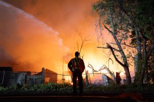 Flames rise over Belleville Township, N.J, as firefighters battle a 14-alarm blaze on May 3. Credit: Lokman Vural Elibol/Anadolu via Getty Images
