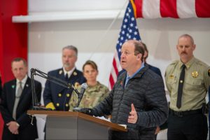 Colorado Gov. Jared Polis speaks at the annual state wildfire outlook briefing in Broomfield, Colo., on April 30. Credit: Drew Cavin/Colorado College Journalism Institute