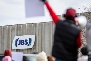 Workers strike at the JBS Beef Production Facility in Greeley, Colo., on March 16. Credit: Brice Tucker/MediaNews Group/Greeley Tribune via Getty Images