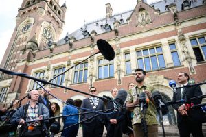 Vishal Prasad, director of Pacific Islands Students Fighting Climate Change, speaks to the media after an International Court of Justice session in The Hague on July 23, 2025. Credit: John Thys/AFP via Getty Images