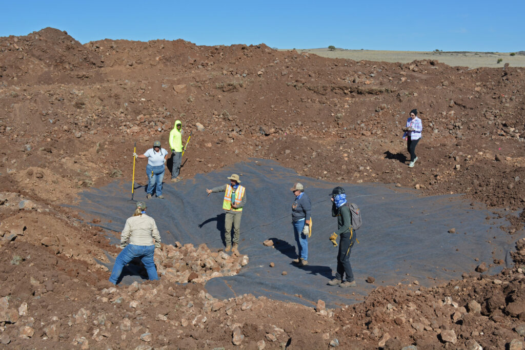 Volunteers work to create a pond as part of a habitat restoration project for the threatened Chiricahua leopard frog in the White Mountains of Arizona. Credit: Wyatt Myskow/Inside Climate News