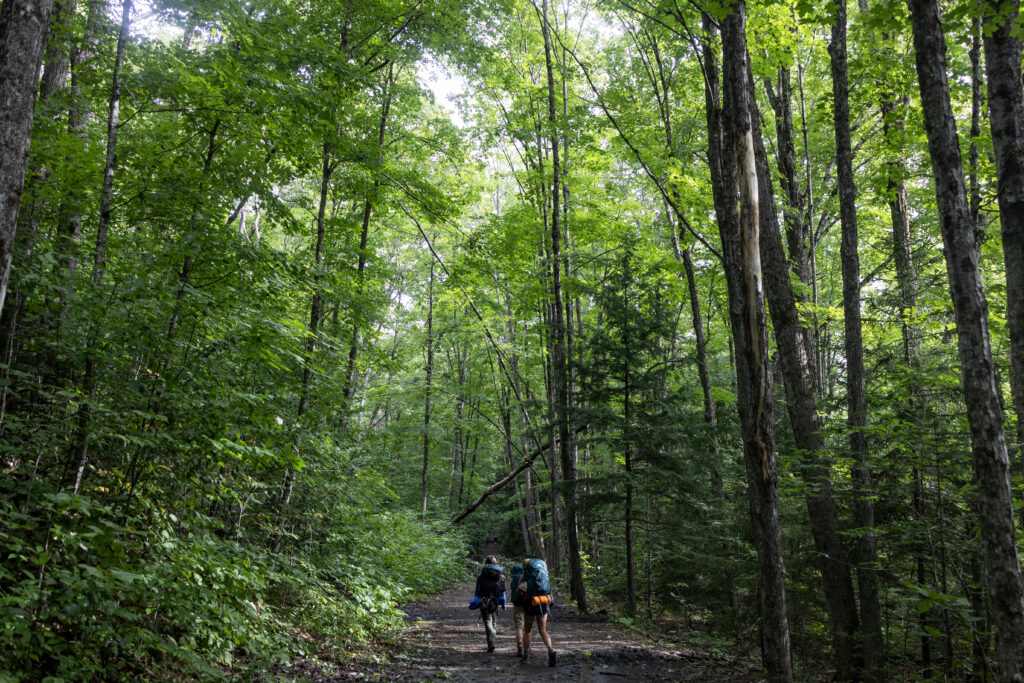 Backpackers hike into the White Mountain National Forest in New Hampshire. Credit: Andrew Lichtenstein/Corbis via Getty Images
