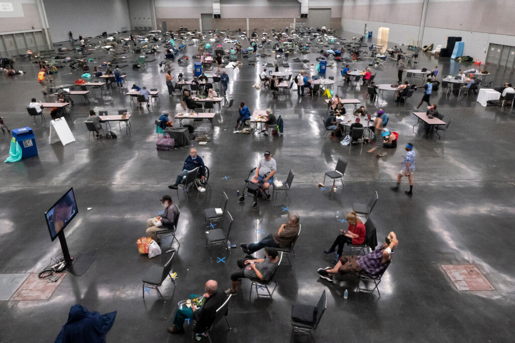 People take shelter in a cooling center in Portland, Ore., on June 27, 2021. Scientists have said the deadly 2021 heatwave in the Pacific Northwest would have been nearly impossible before human-caused global warming. Credit: Nathan Howard/Getty Images