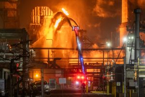 Crews work to extinguish a fire after an explosion at a Chevron refinery on Oct. 2, 2025, in El Segundo, Calif. Credit: Apu Gomes/Getty Images