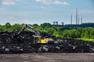 The shuttered Homer City Generating Station sits in the background of a coal cleanup site in Center Township, Pa., on June 12, 2024. Credit: Scott Lewis/The Washington Post via Getty Images
