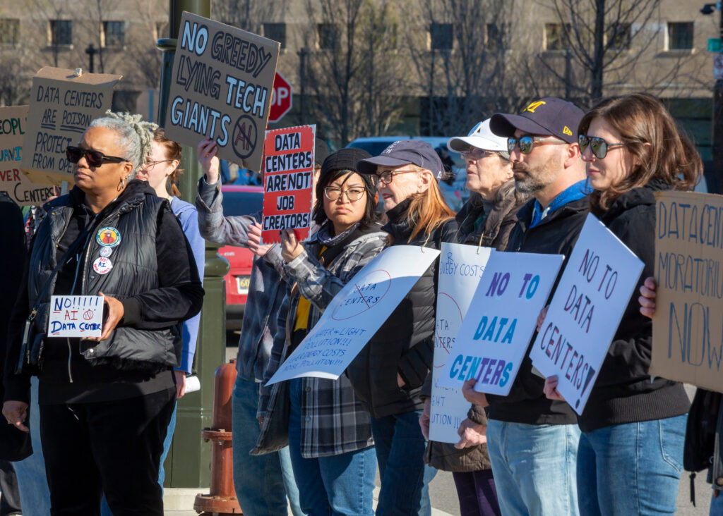 Michigan residents rally against data centers on April 11 in Detroit, one of six protests held across the state. Credit: Jim West/Universal Images Group via Getty Images