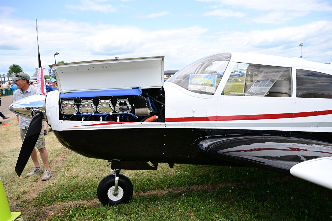 A 1964 Piper Comanche 400 is seen at the Experimental Aircraft Association’s AirVenture in Oshkosh, Wisc. The average single engine piston aircraft age is 50 years old. Credit: Andrew Liu/Inside Climate News