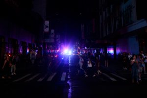 People walk around Manhattan during a power outage in New York City on July 13, 2019. Credit: Johannes Eisele/AFP via Getty Images