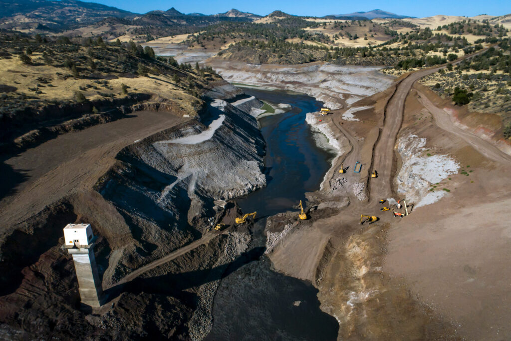 Construction crews remove the remaining pieces of the Iron Gate Dam, allowing the Klamath River to run in its original path near Hornbrook, Calif., on Aug. 28, 2024. Credit: Carlos Avila Gonzalez/San Francisco Chronicle via Getty Images