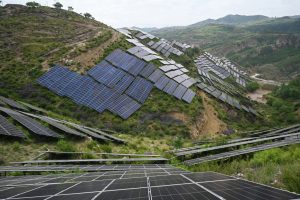 Solar panels fill a hillside near Jiexiu, China. Credit: Greg Baker/AFP via Getty Images