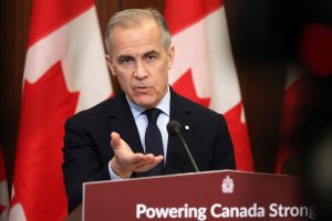 Canadian Prime Minister Mark Carney speaks about clean energy initiatives during a news conference on May 14 in Ottawa. Credit: Dave Chan/AFP via Getty Images