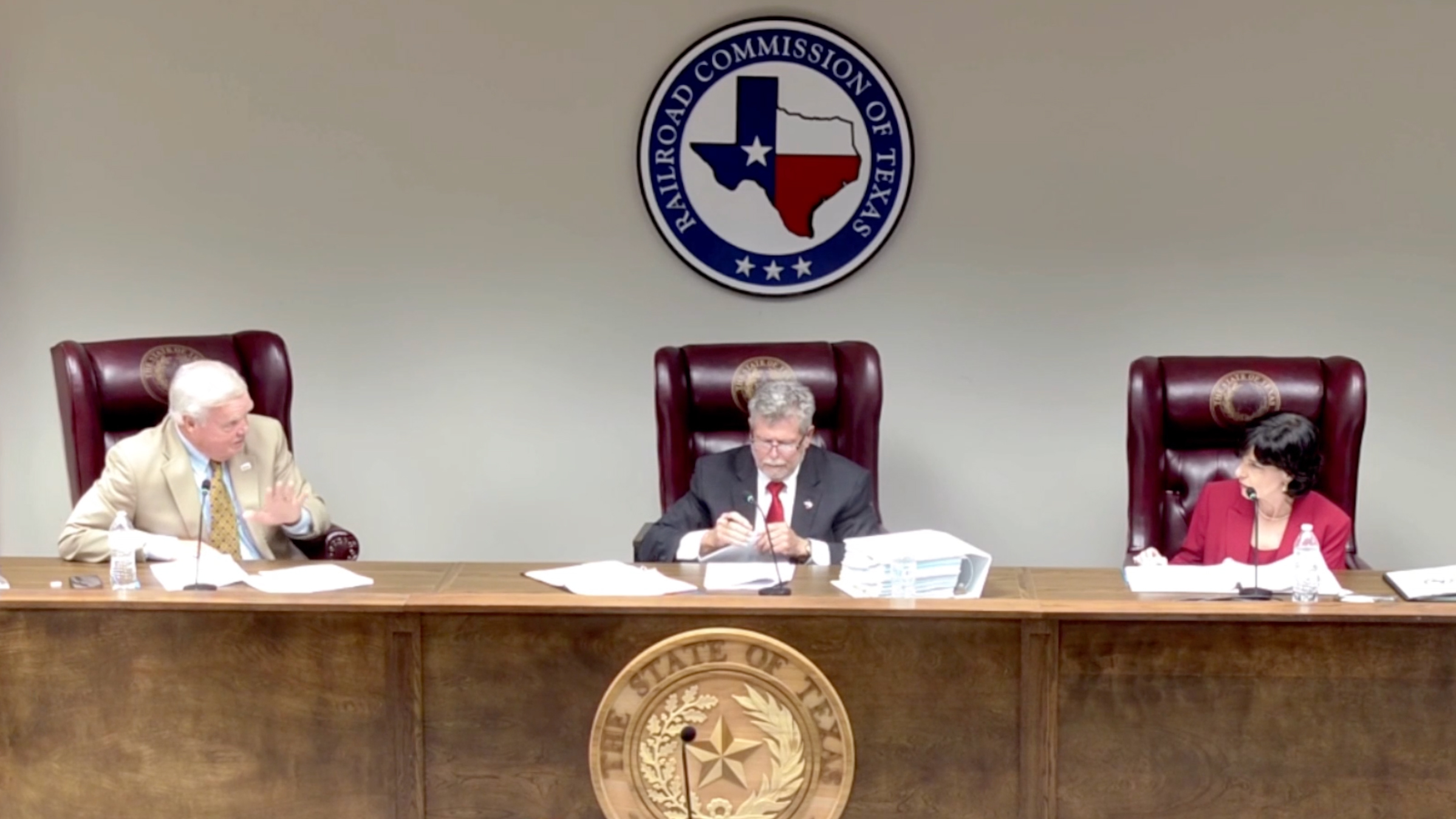 Commissioner Wayne Christian (left) introduces a new public participation policy during the Railroad Commission of Texas meeting on Tuesday. Source: RRC Webcast