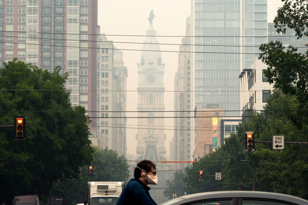 Wildfire smoke blankets Philadelphia on June 7, 2023. Credit: Joe Lamberti/AFP via Getty Images