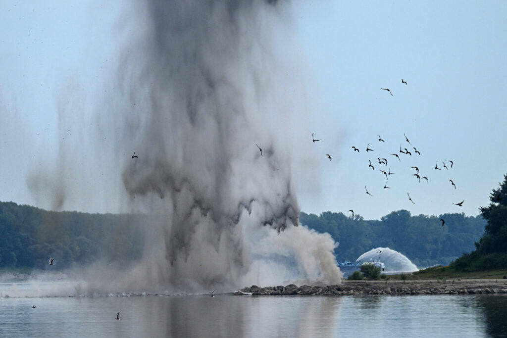 The Romanian Navy conducts a controlled underwater explosion on the Danube River in the village of Izvoarele on Monday. Credit: Daniel Mihailescu/AFP via Getty Images