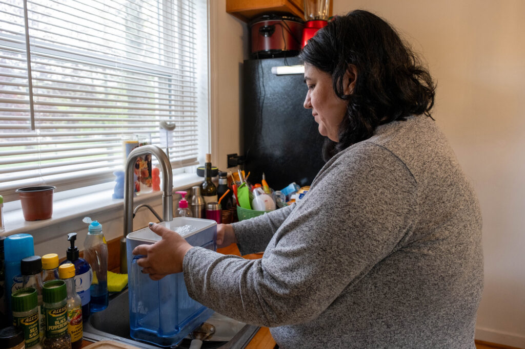 Gina Ramirez, like many Chicago residents, has a lead service line at her home on the Southeast Side. Credit: Keerti Gopal/Inside Climate News