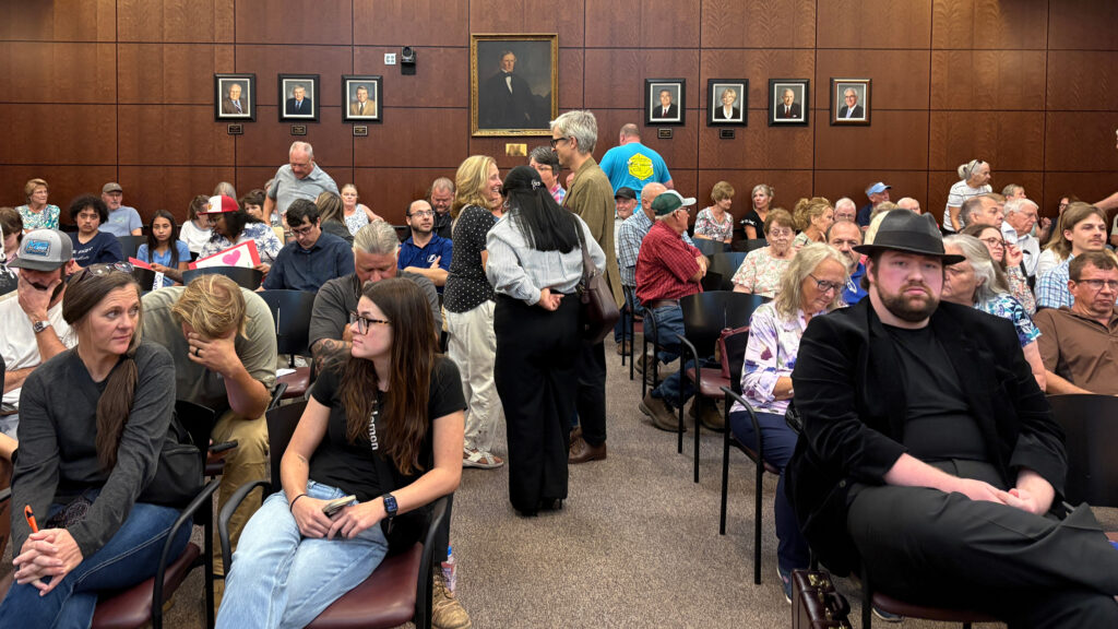 Opponents of Maymead’s proposed asphalt plant petition Forsyth County Commissioners on Aug. 27 to halt the project. Credit: Lisa Sorg/Inside Climate News