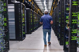 A Meta worker leads a tour of the company’s data center in Temple, Texas, on July 22. Credit: Mikala Compton/The Austin American-Statesman via Getty Images