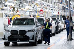 Cars move through the assembly line at a BMW manufacturing plant in Greer, S.C. Credit: Sven Hoppe/dpa via Getty Images