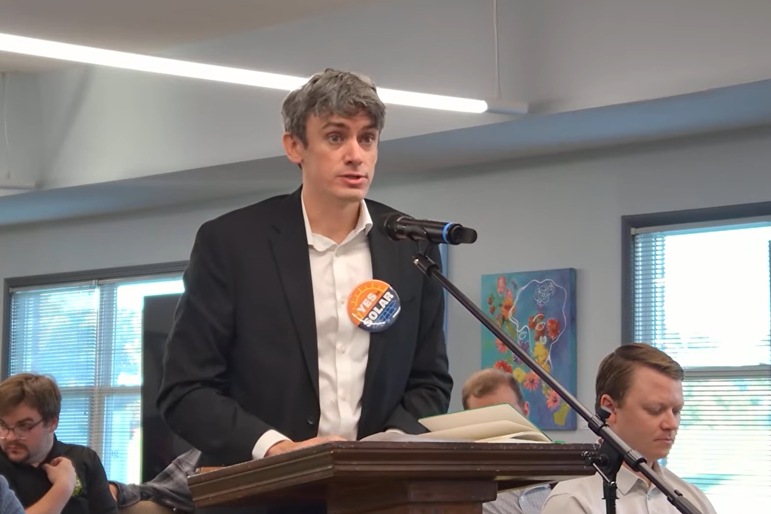 John Smillie speaks in support of a proposed utility-scale solar project at a Montgomery County Board of Commissioners meeting on Sept. 28 in Crawfordsville, Ind. Credit: Montgomery County, Indiana livestream