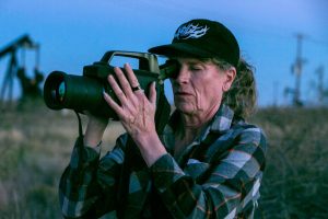 Sharon Wilson records methane emissions in the Permian Basin on Dec. 4, 2025. Credit: Dylan Baddour/Inside Climate News