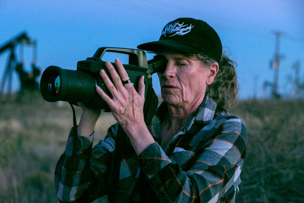 Sharon Wilson records methane emissions in the Permian Basin on Dec. 4, 2025. Credit: Dylan Baddour/Inside Climate News