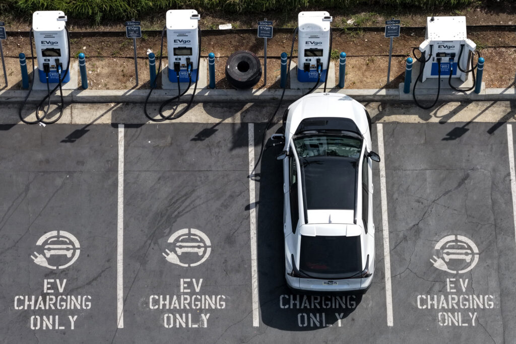 An EV charges at a station in Monrovia, Calif., on March 30. Credit: Justin Sullivan/Getty Images