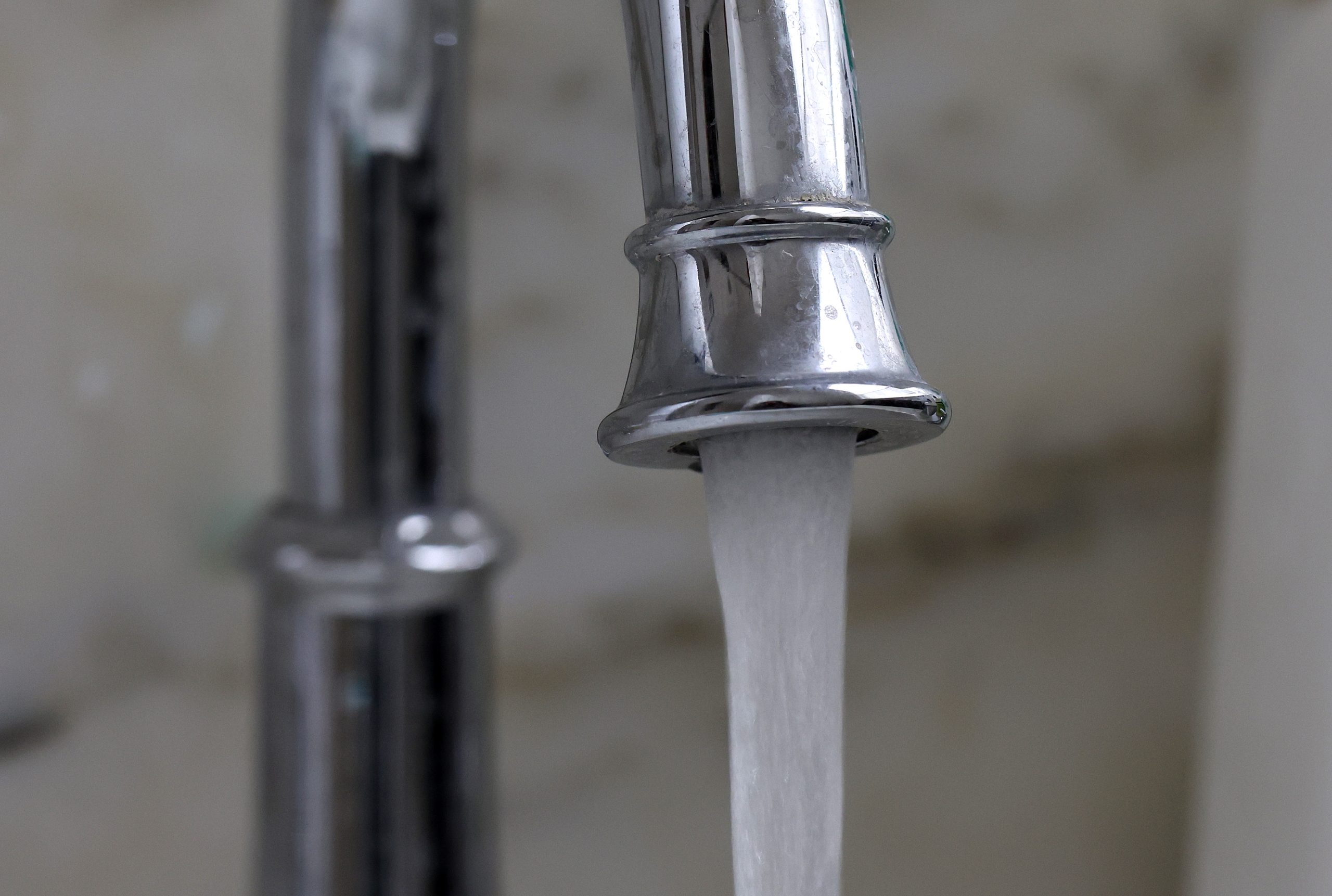 A new study that reanalyzed federal monitoring datafound that estimated PFAS concentrations in U.S. drinking water could be more than twice as high as calculations that treat results below laboratory reporting limits as zero suggest. Credit: Justin Sullivan/Getty Images.